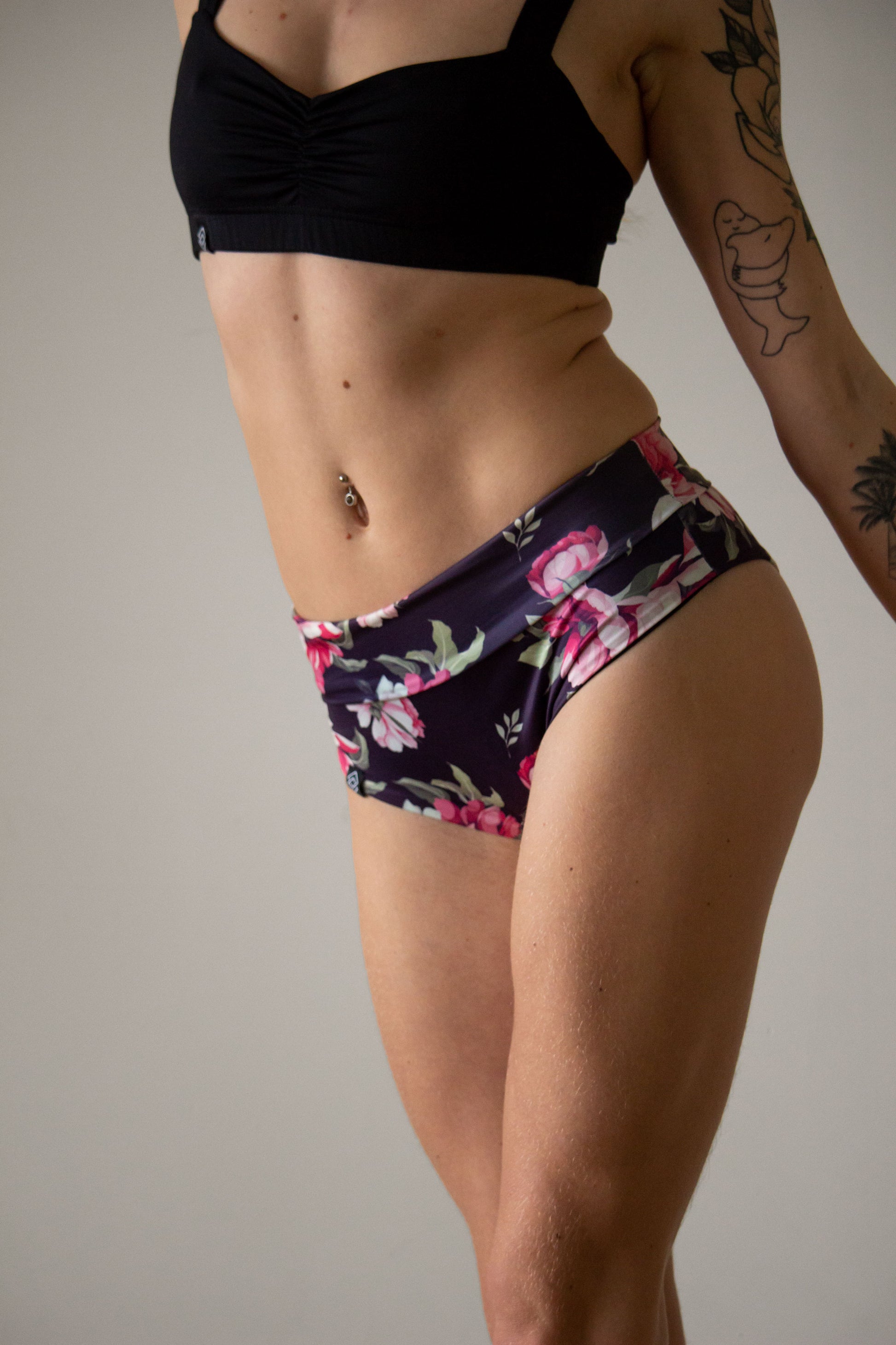 High waist floral print shorts for pole dance with a cheeky brazil scrunch back, folded down to a mid low waist